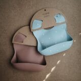Mushie Silicone Bib - White Daisy - Image 5